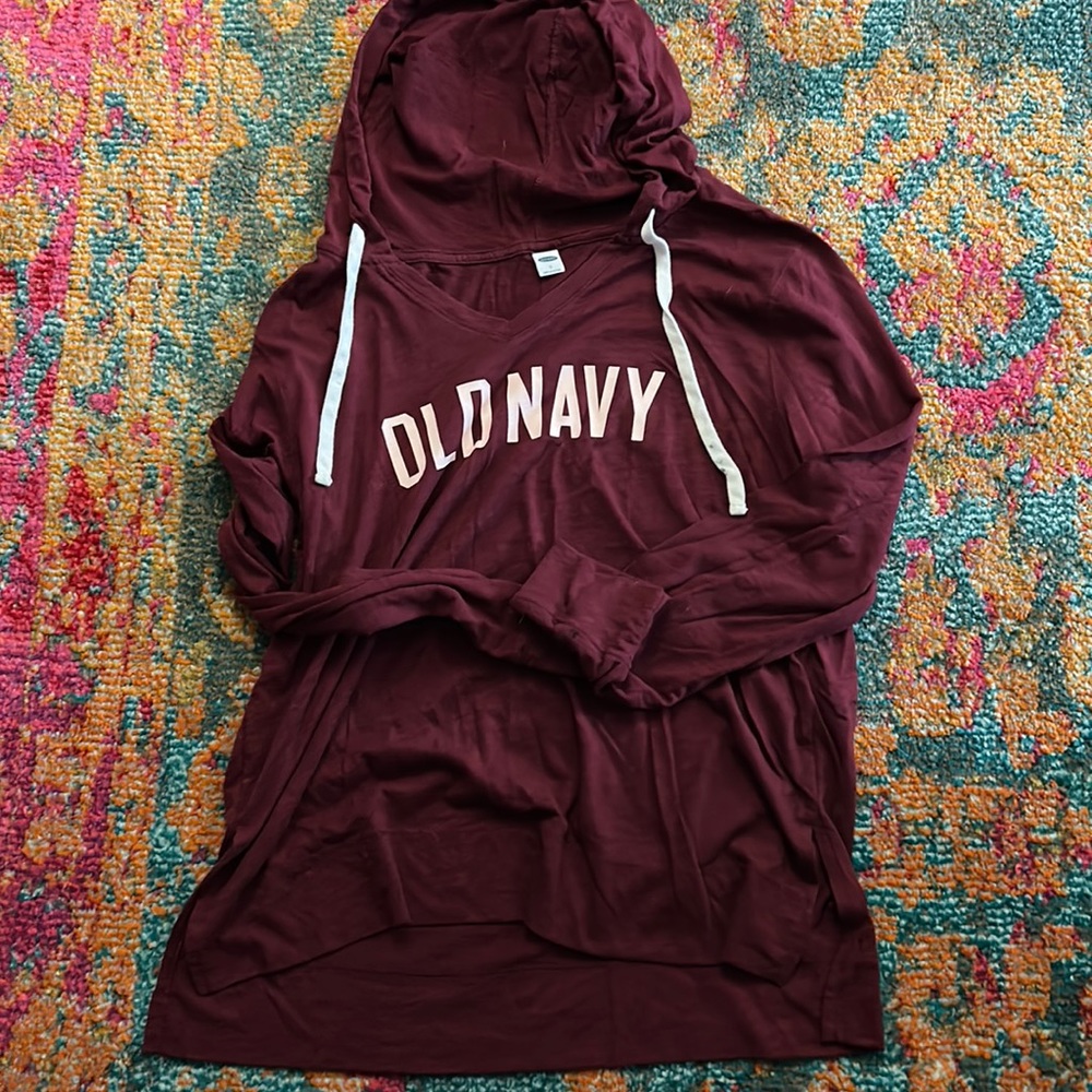 Long sleeve, light weight top with hood maroon in color